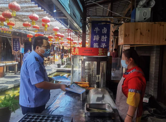 J9九游会 九游会J9西咸新区市监局泾河新城分局开展食品安全宣传周系列活动(图6)